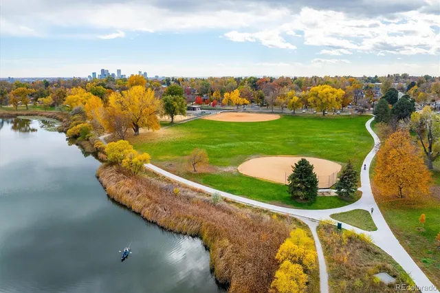 a view of a swimming pool with a lake view
