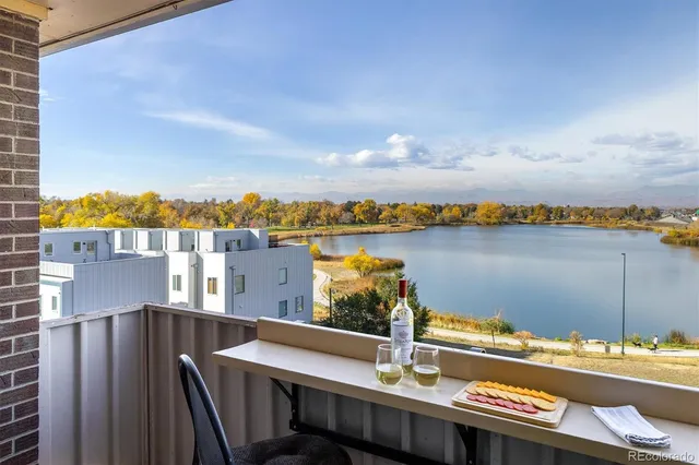 a view of a balcony with city view