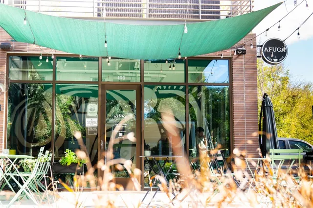 a view of a building with a garden