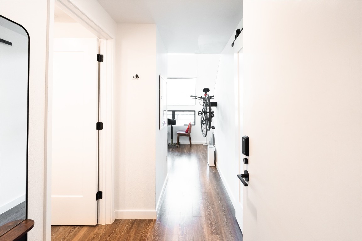 49 Navasota Street, Unit 209 Austin, TX 78702 - Photo 3 of 32 a view of a bathroom with a sink