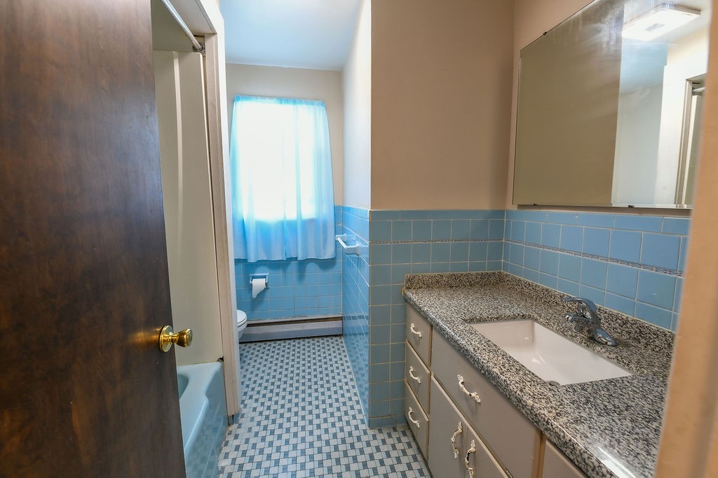 281 Ellison Street Rochester, NY 14609 - Photo 15 of 26 2nd full bath on main level, granite counter and e