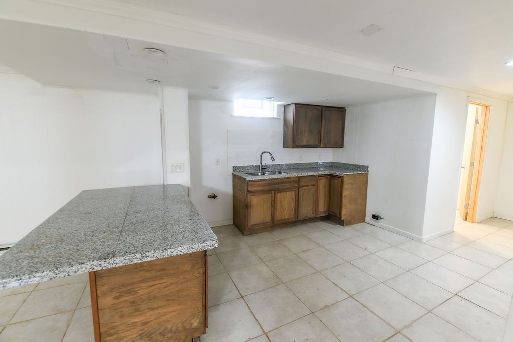281 Ellison Street Rochester, NY 14609 - Photo 16 of 26 Basement possible 2nd kitchen granite counters