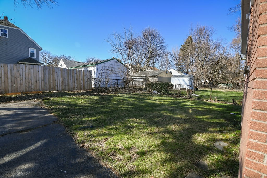281 Ellison Street Rochester, NY 14609 - Photo 24 of 26 Back yard, driveway extends way back for plenty of