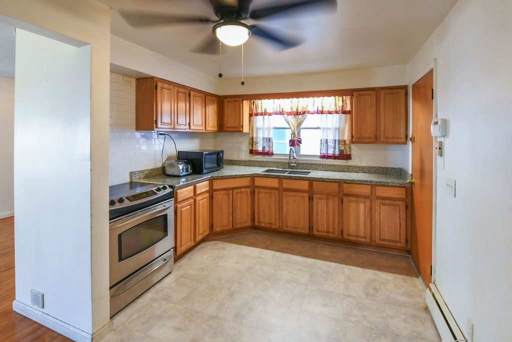 281 Ellison Street Rochester, NY 14609 - Photo 7 of 26 Kitchen with stainless steel oven/electric cooktop