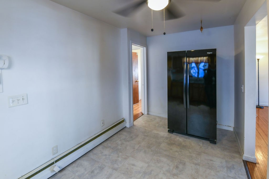 281 Ellison Street Rochester, NY 14609 - Photo 8 of 26 Plenty of room for the fridge across from counters