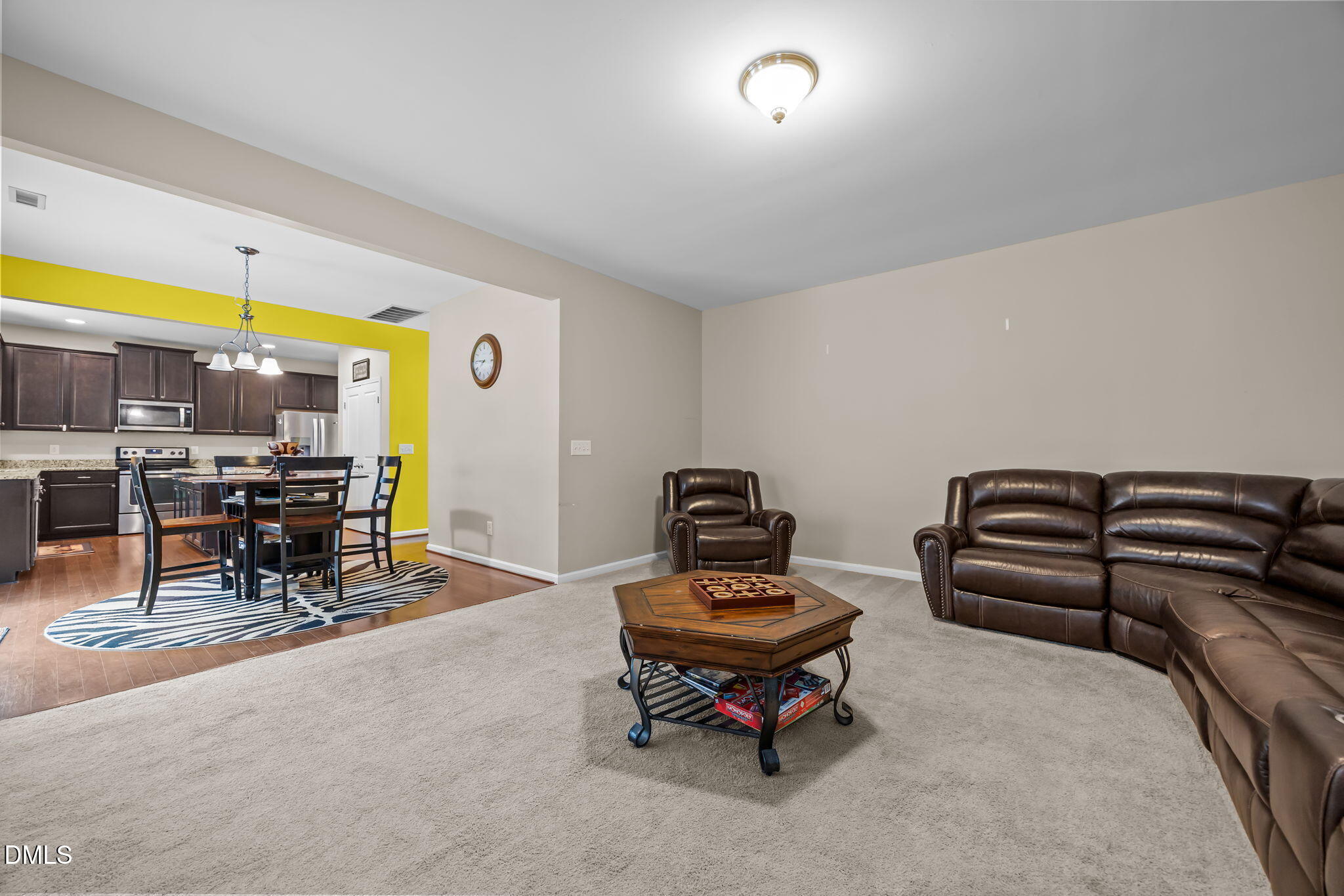 2021 Muddy Creek Court Raleigh, NC 27610 - Photo 10 of 47 a living room with furniture and a table