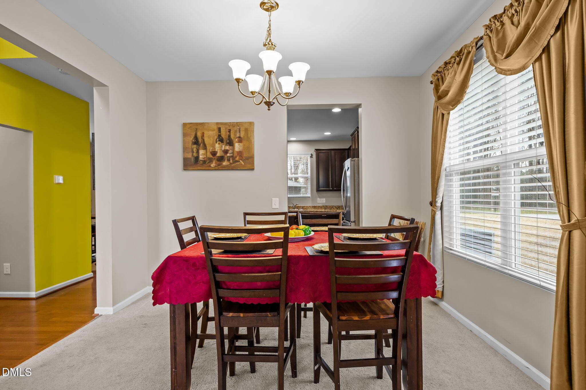 2021 Muddy Creek Court Raleigh, NC 27610 - Photo 17 of 47 a view of a dining room with furniture and a window