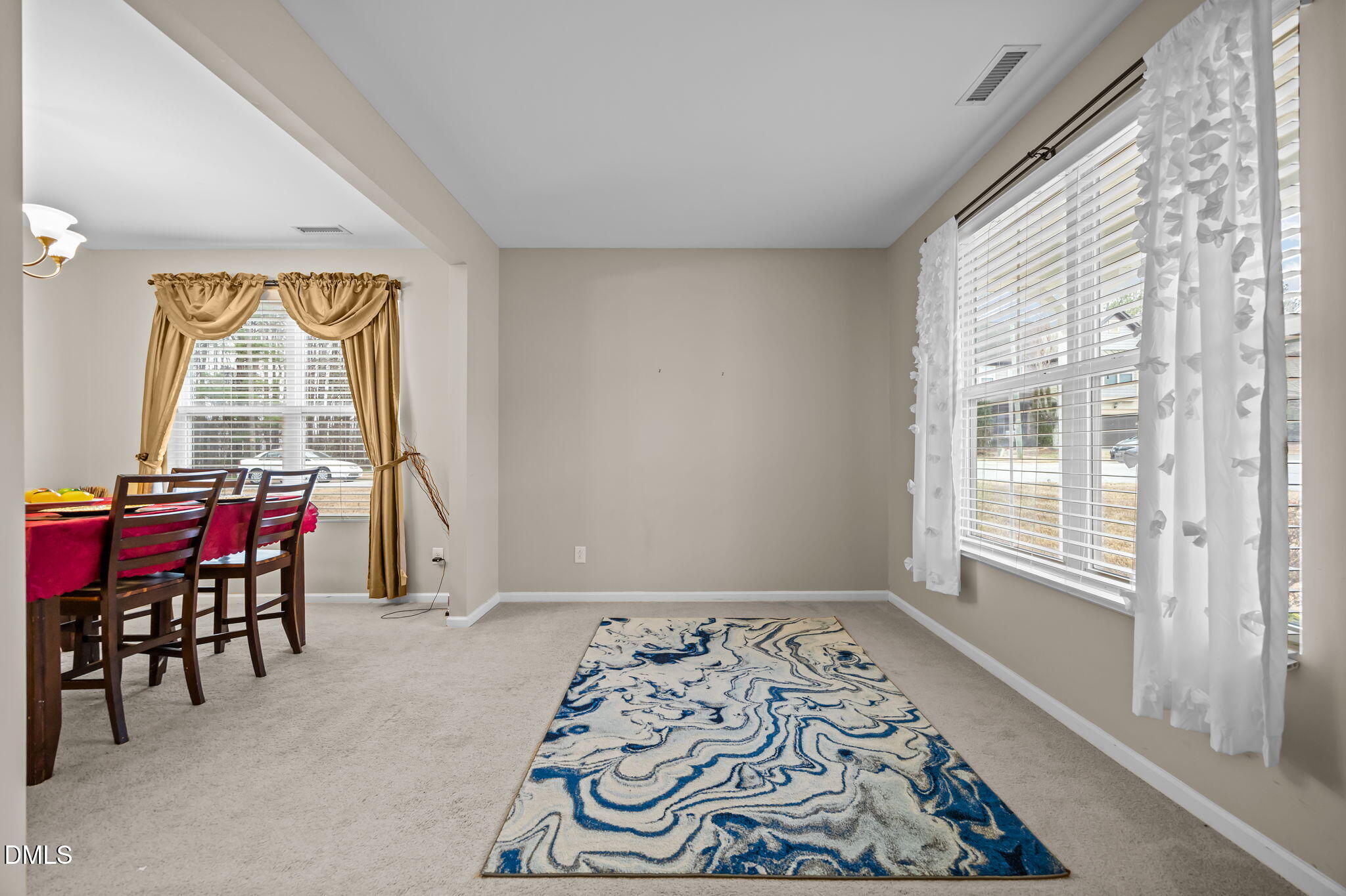 2021 Muddy Creek Court Raleigh, NC 27610 - Photo 18 of 47 a view of a livingroom with furniture and a window