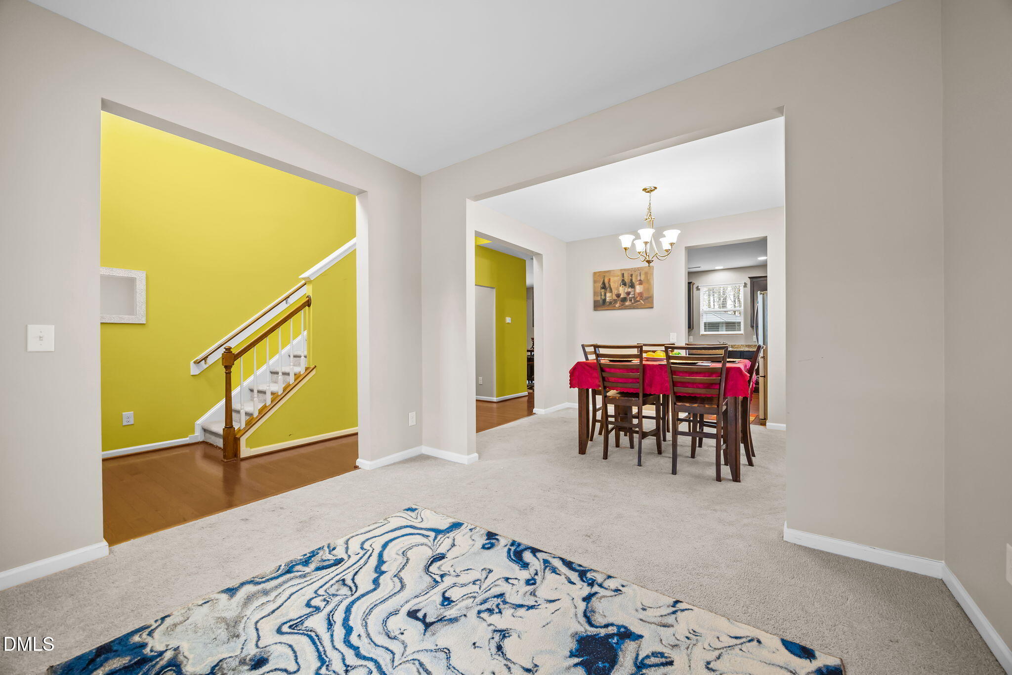 2021 Muddy Creek Court Raleigh, NC 27610 - Photo 19 of 47 a living room with furniture and a large window