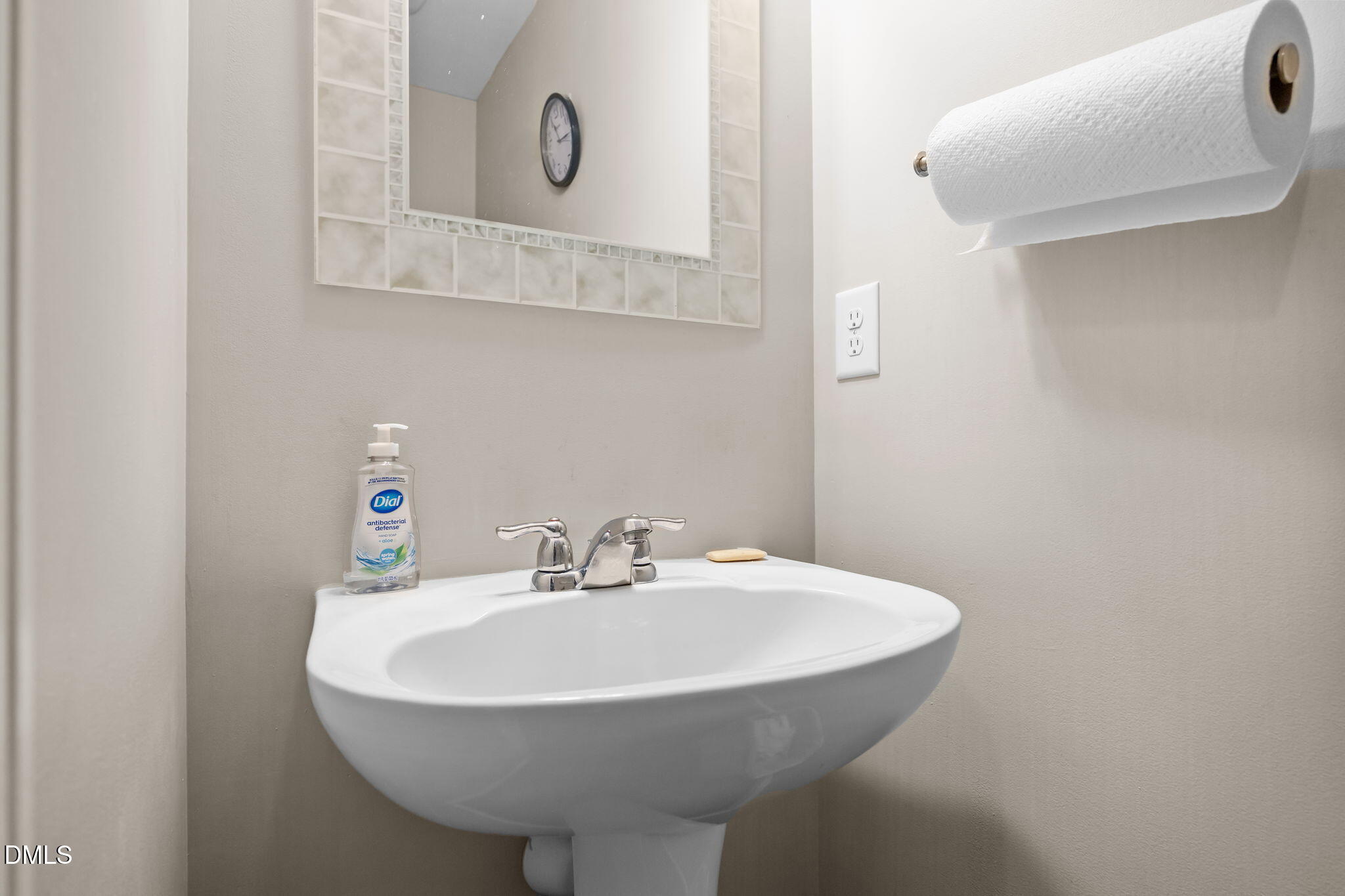 2021 Muddy Creek Court Raleigh, NC 27610 - Photo 23 of 47 a bathroom with a sink and a mirror