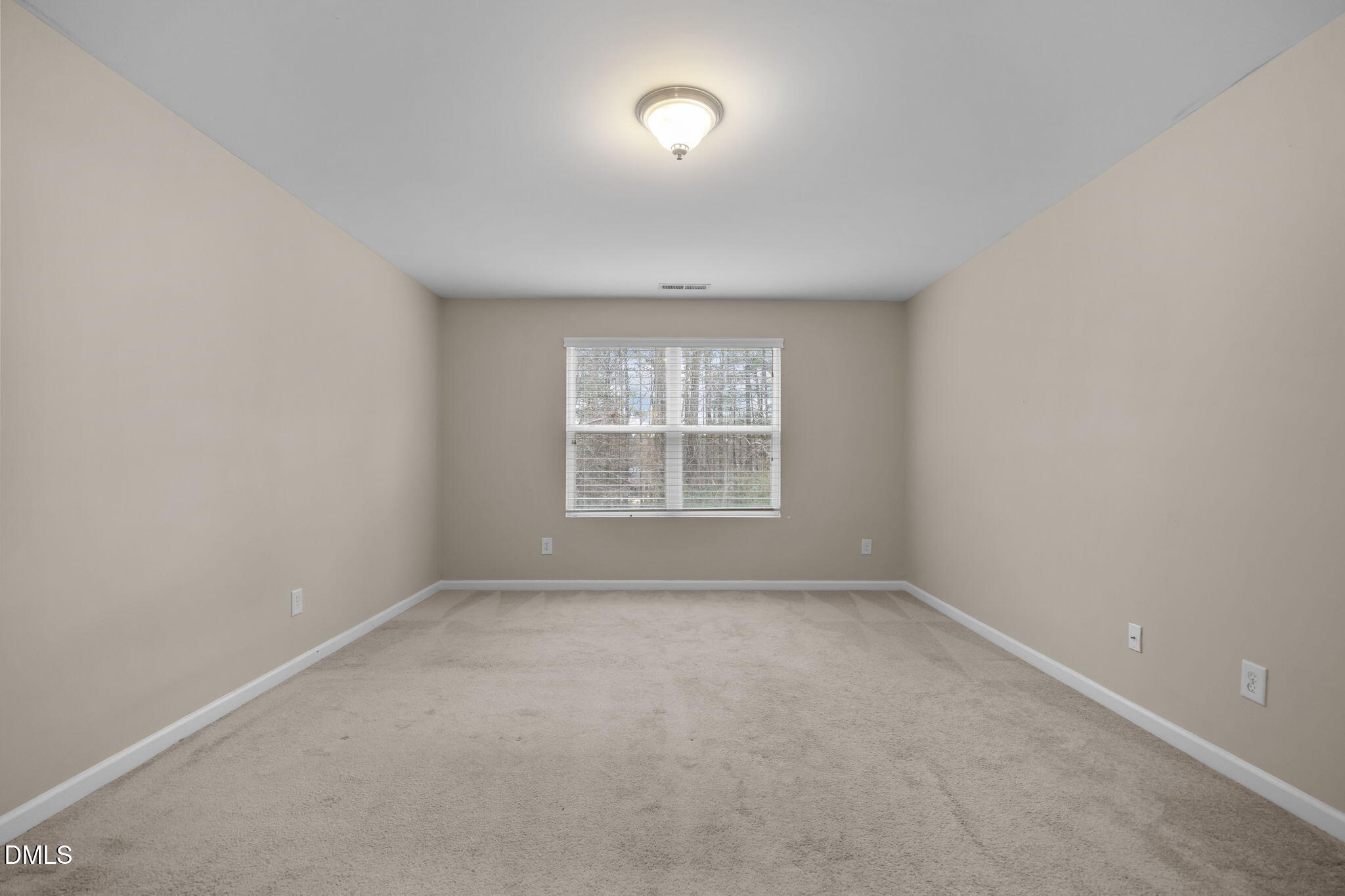 2021 Muddy Creek Court Raleigh, NC 27610 - Photo 29 of 47 an empty room with a window