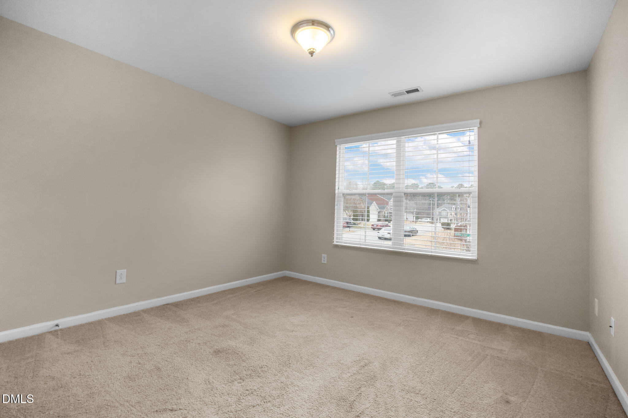 2021 Muddy Creek Court Raleigh, NC 27610 - Photo 34 of 47 an empty room with a window