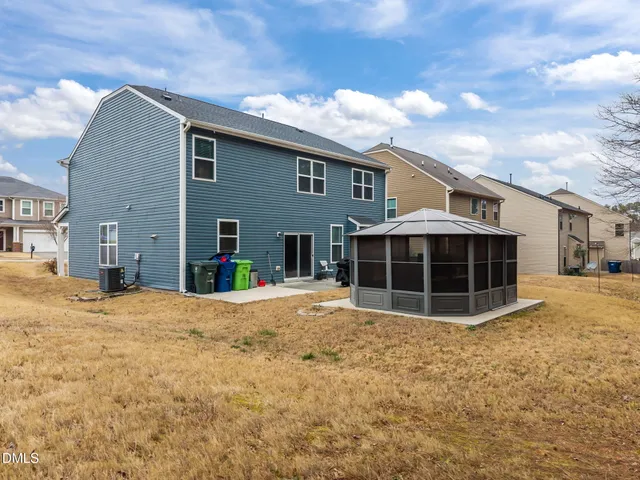 a view of a house with a patio
