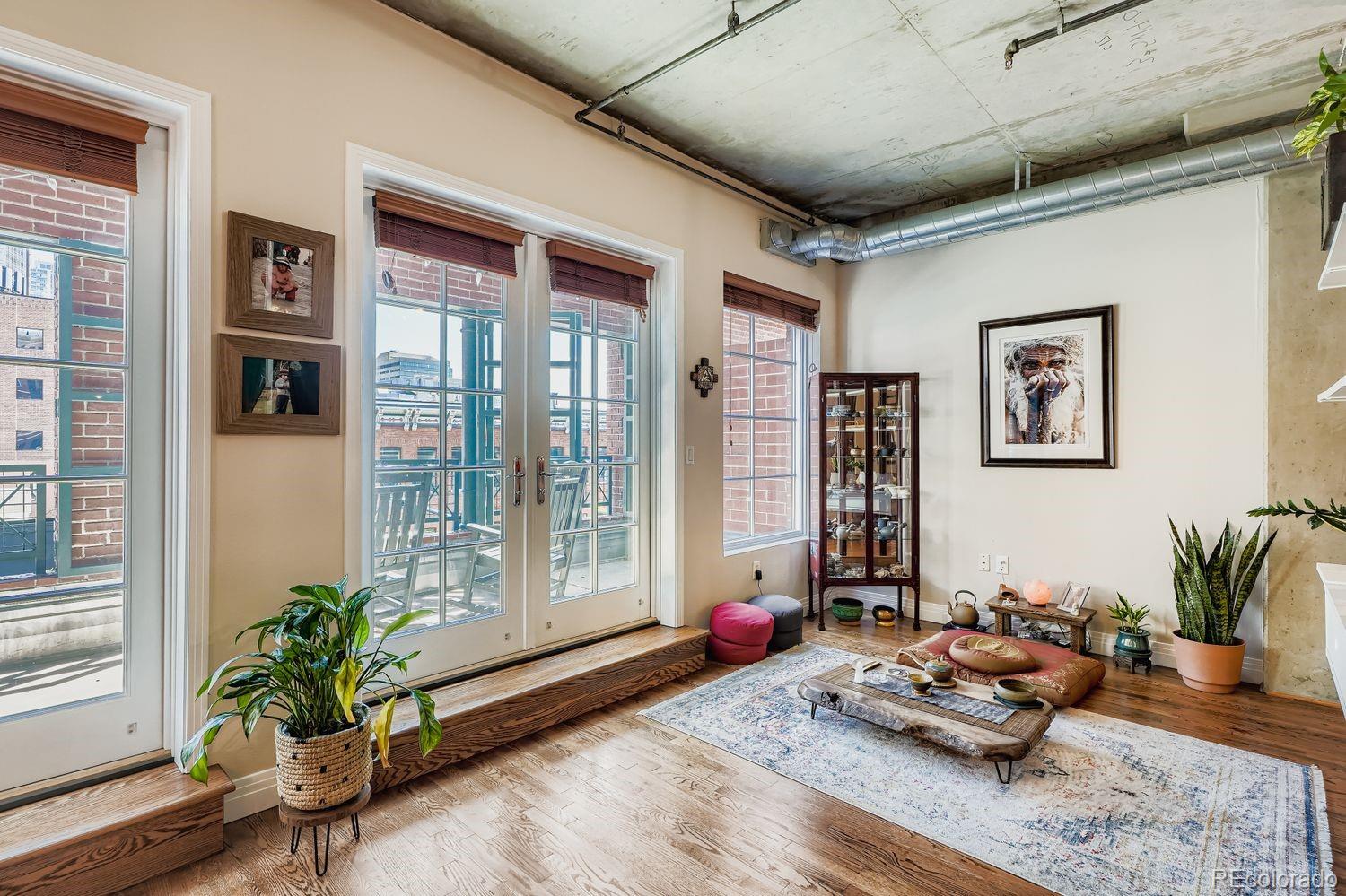 1499 Blake Street, Unit 4G Denver, CO 80202 - Photo 12 of 33 a living room with furniture