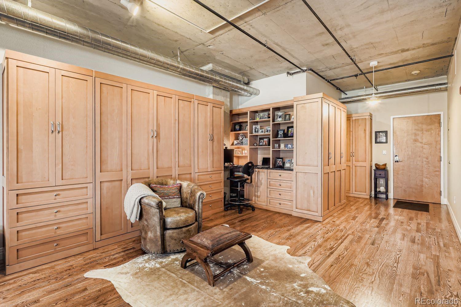 1499 Blake Street, Unit 4G Denver, CO 80202 - Photo 17 of 33 a living room with furniture