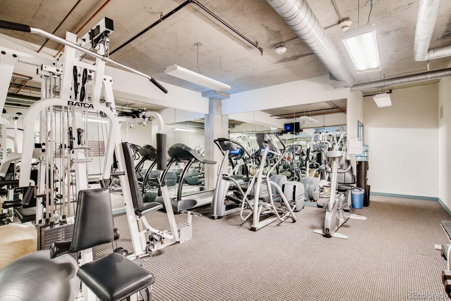 1499 Blake Street, Unit 4G Denver, CO 80202 - Photo 31 of 33 a view of a room with gym equipment