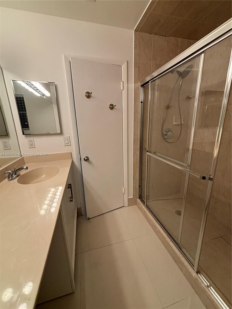 River Run Miramar, FL 33025 - Photo 14 of 29 a bathroom with a shower and a sink