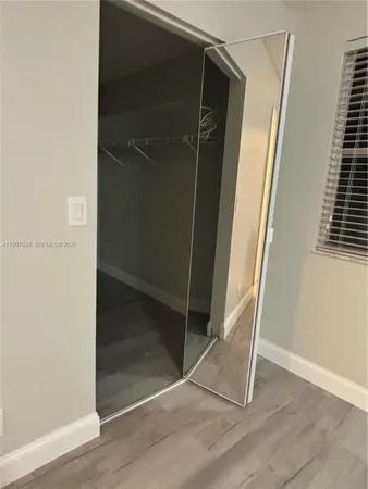 a view of a room with racks on the wall