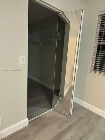 a view of a room with racks on the wall