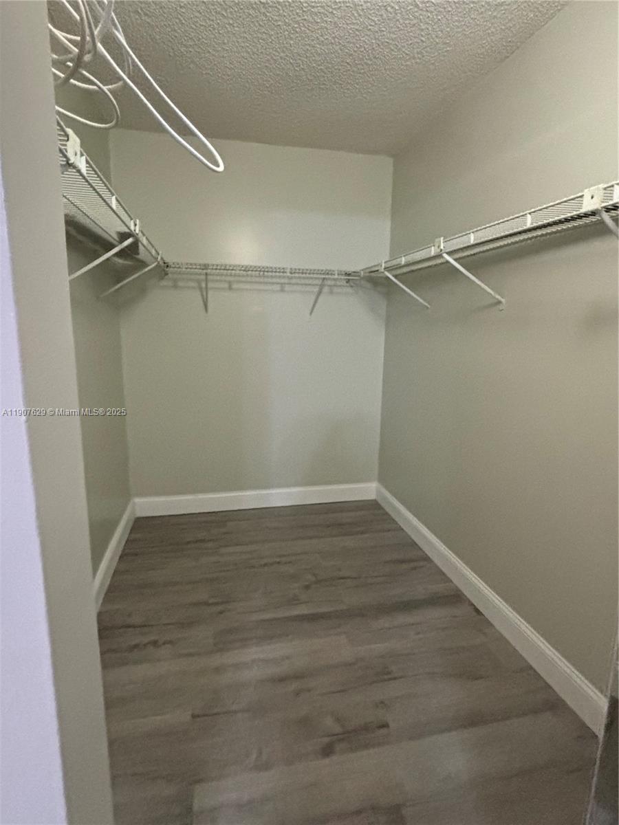 River Run Miramar, FL 33025 - Photo 10 of 29 a view of a room with racks on the wall