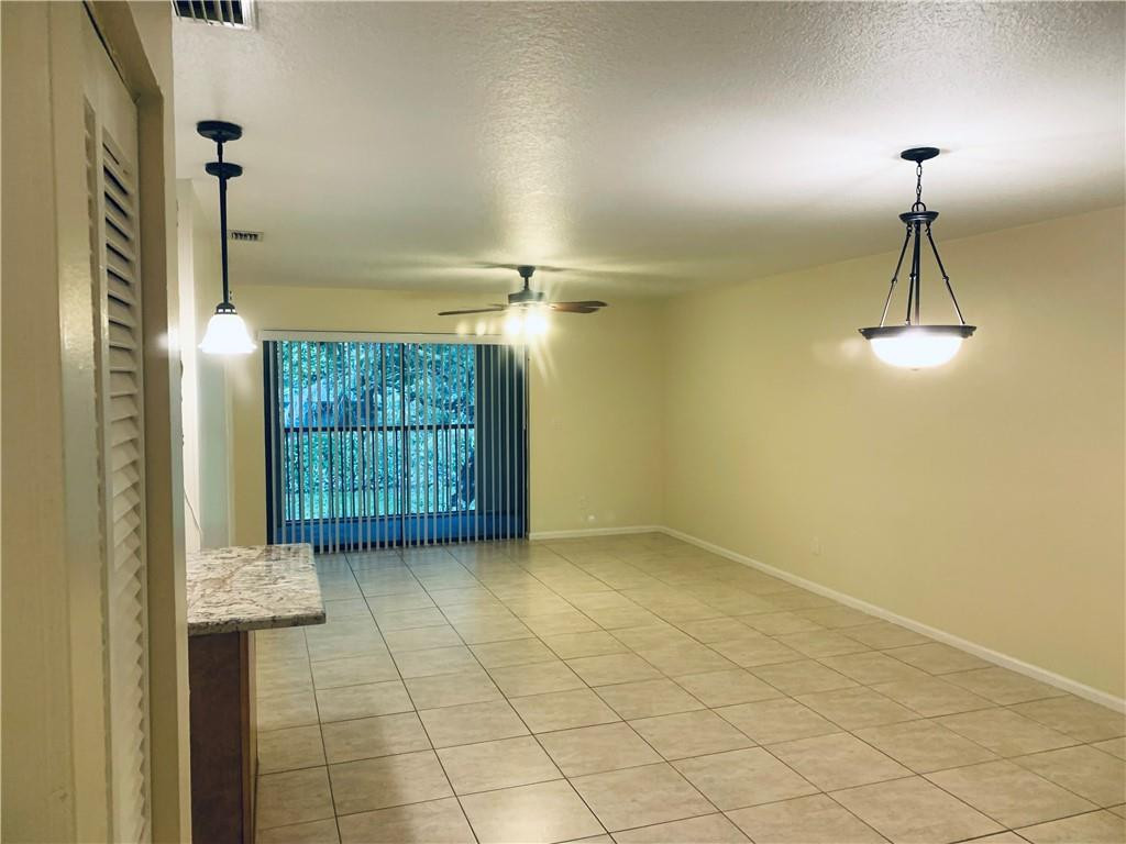 9601 Riverside Drive, Unit A10 Coral Springs, FL 33071 - Photo 14 of 15 a view of empty room with windows