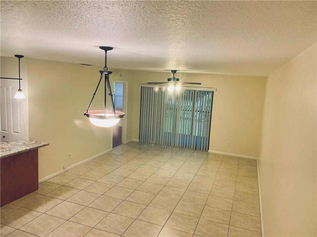 9601 Riverside Drive, Unit A10 Coral Springs, FL 33071 - Photo 15 of 15 a view of a livingroom with a staircase