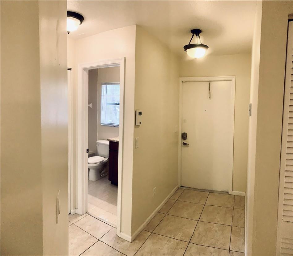 9601 Riverside Drive, Unit A10 Coral Springs, FL 33071 - Photo 2 of 15 a view of a bathroom from a bathroom