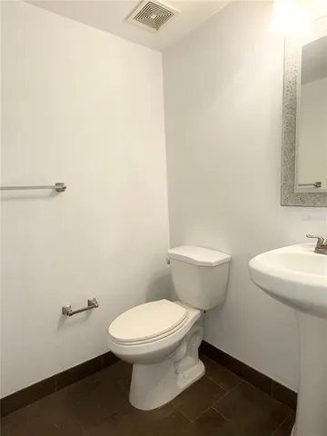 a view of backyard with green space