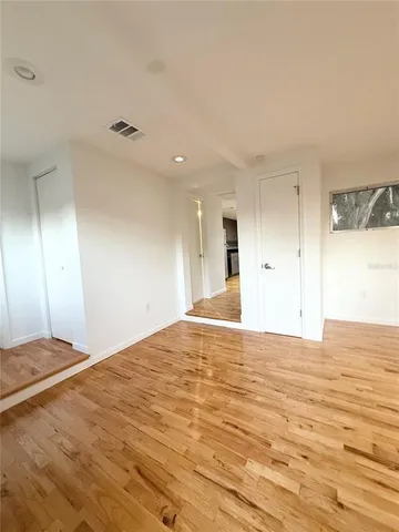 a view of an empty room and window