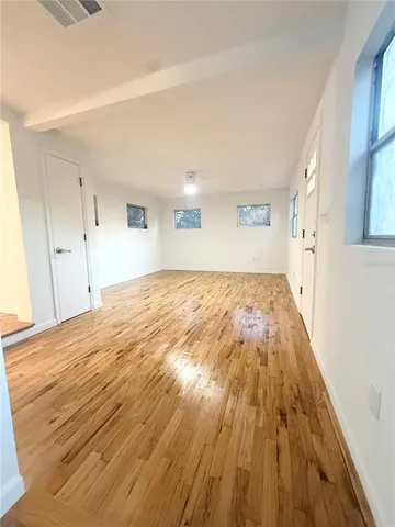 a kitchen with stainless steel appliances kitchen island granite countertop a refrigerator and stove top oven