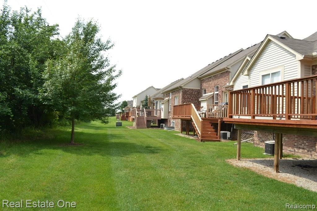 45586 Rathmore Drive, Unit 276 Macomb, MI 48044 - Photo 25 of 25 Common Area in Back