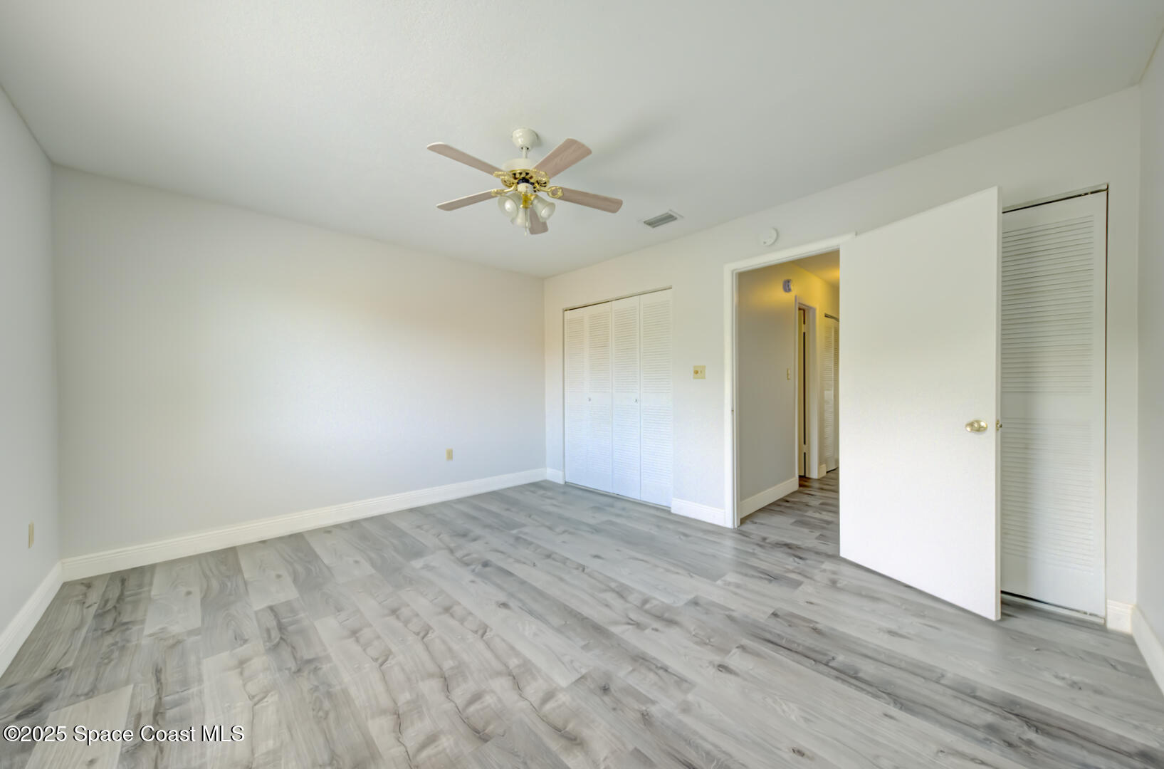 4749 Sisson Road Titusville, FL 32780 - Photo 20 of 30 bedroom 1 with 2 closets
