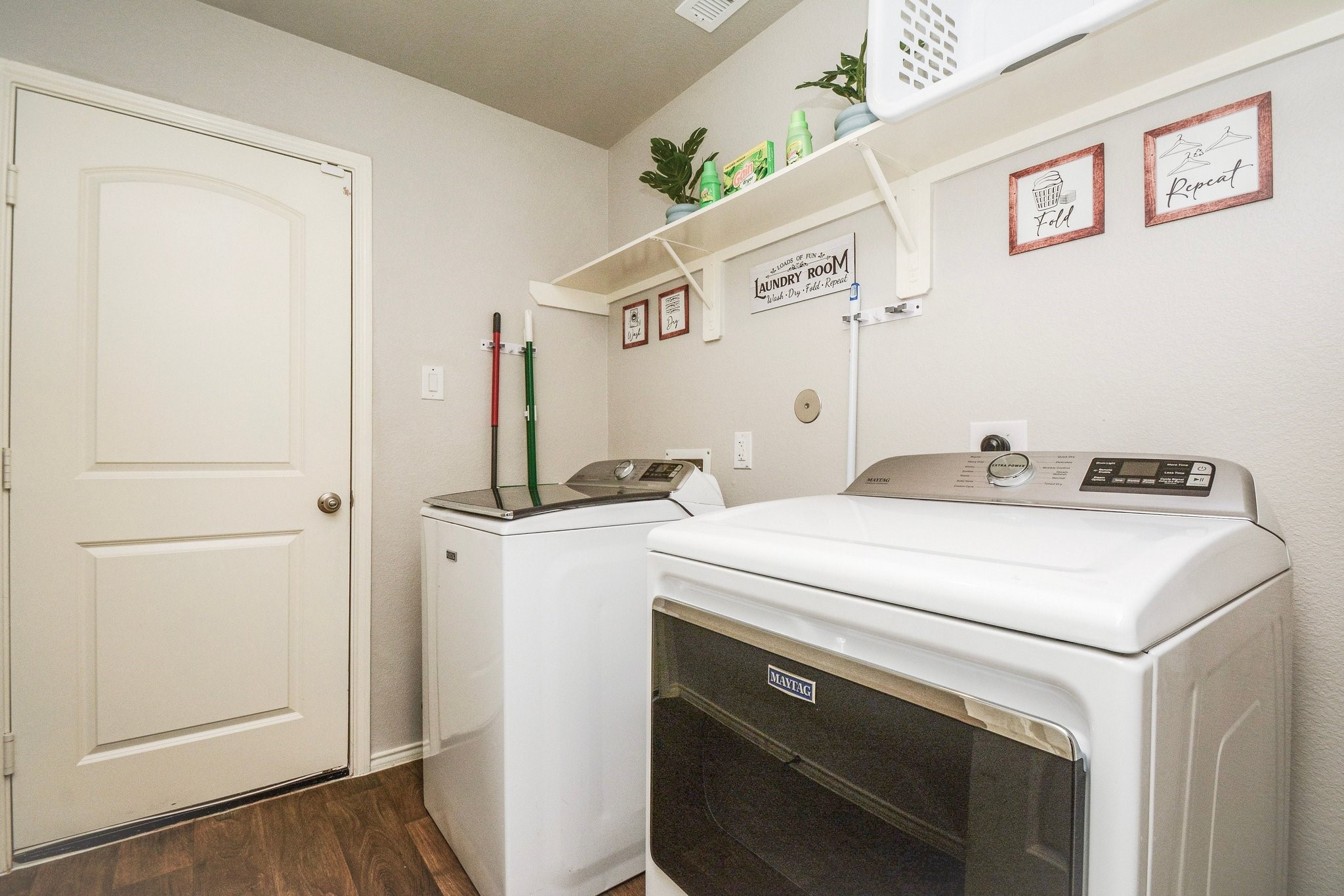 23510 Harrow Fld Lane Spring, TX 77373 - Photo 15 of 18 a utility room with dryer and washer