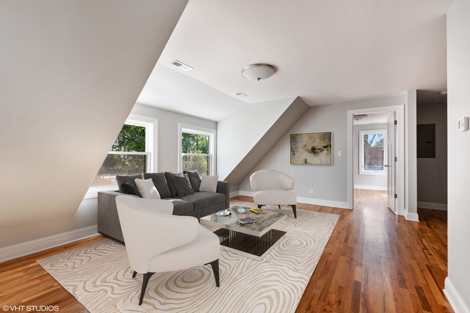 1131 Ridge Road, Unit 2 Wilmette, IL 60091 - Photo 4 of 12 a living room with furniture and wooden floor