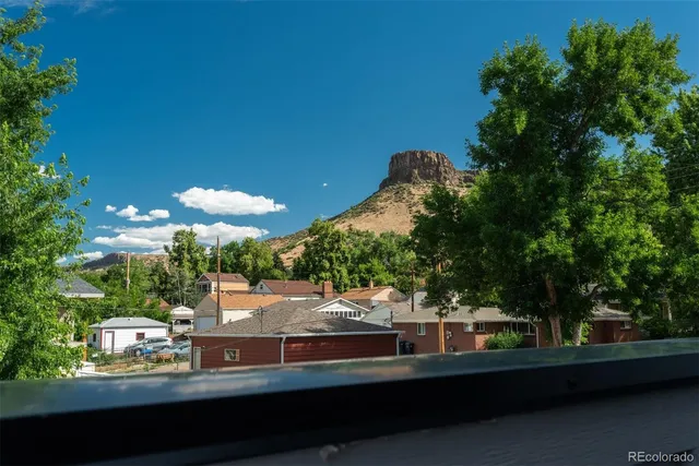 a view of a building from a balcony