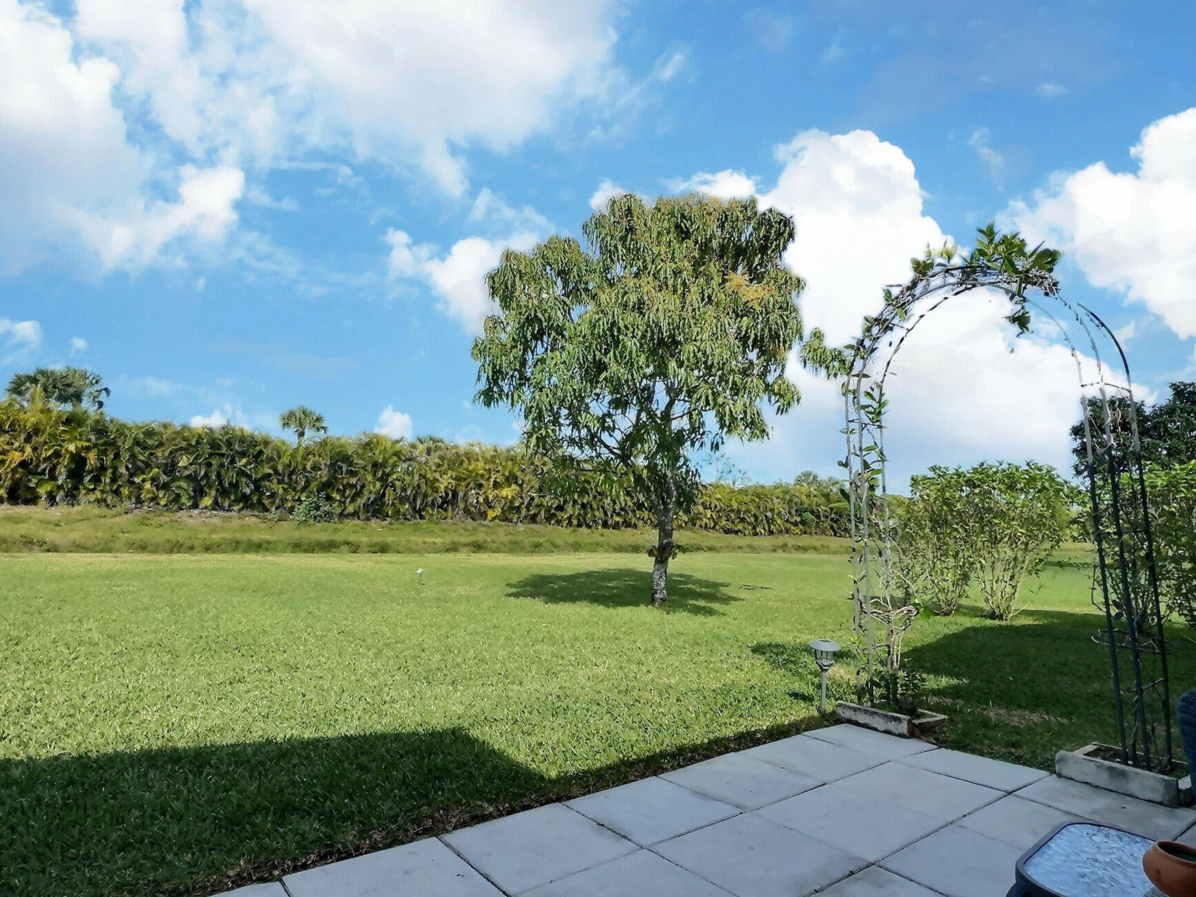 10585 Greenbriar Court Boca Raton, FL 33498 - Photo 27 of 37 Backyard Patio