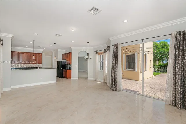 a view of a room with large window