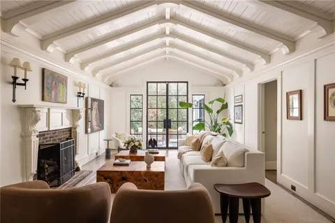 a bathroom with a granite countertop sink mirror and bathtub