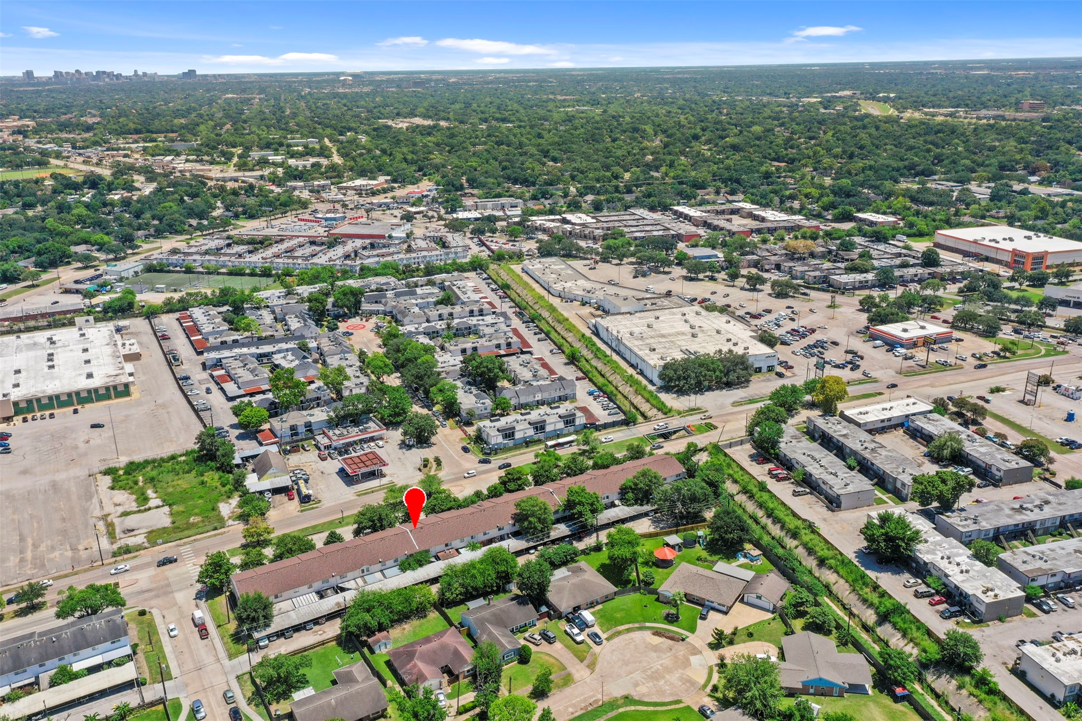 8216 Fondren Road, Unit 8216 Houston, TX 77074 - Photo 32 of 33 an aerial view of residential houses with outdoor space