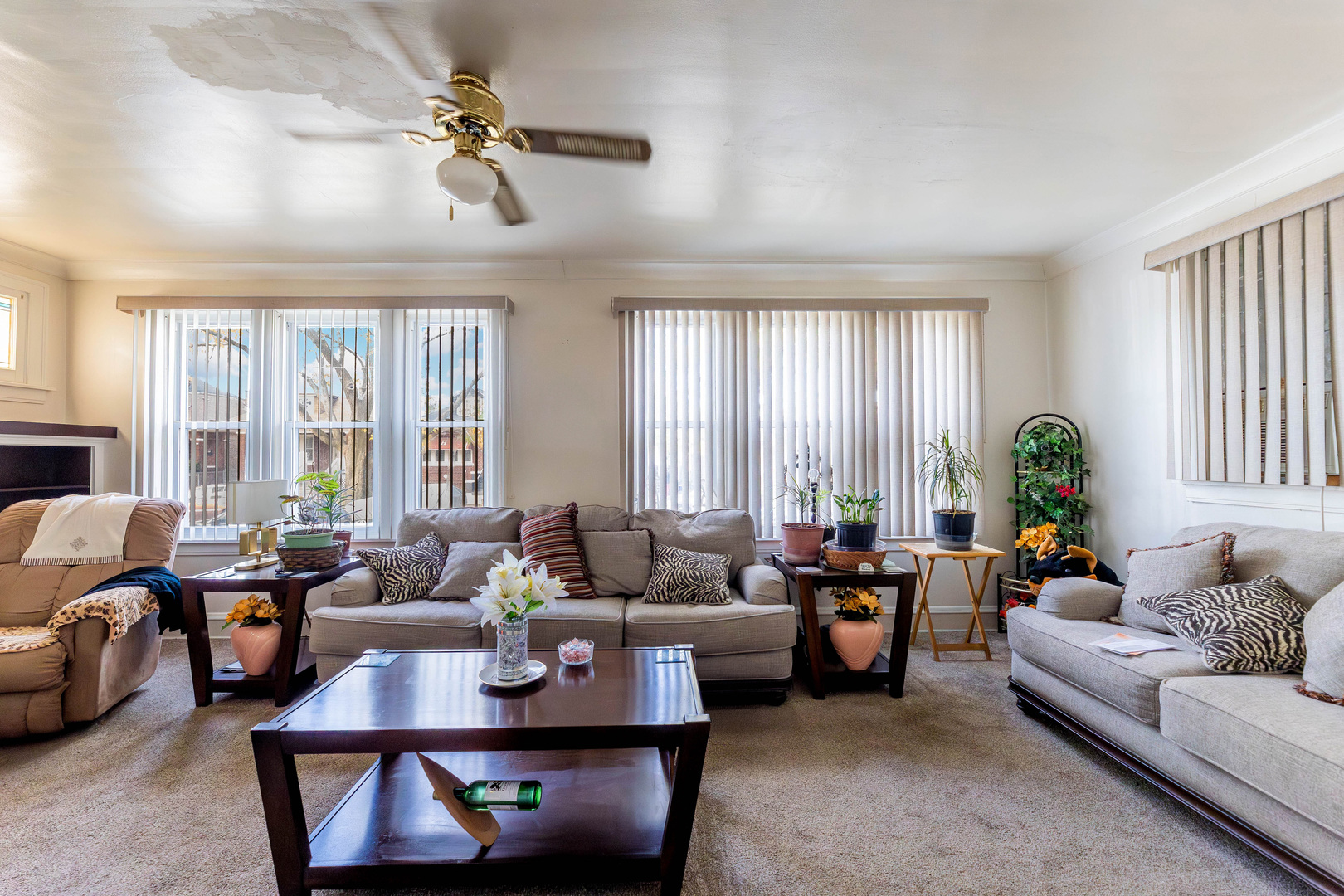 8129 South Cornell Avenue Chicago, IL 60617 - Photo 3 of 16 a living room with furniture and a large window