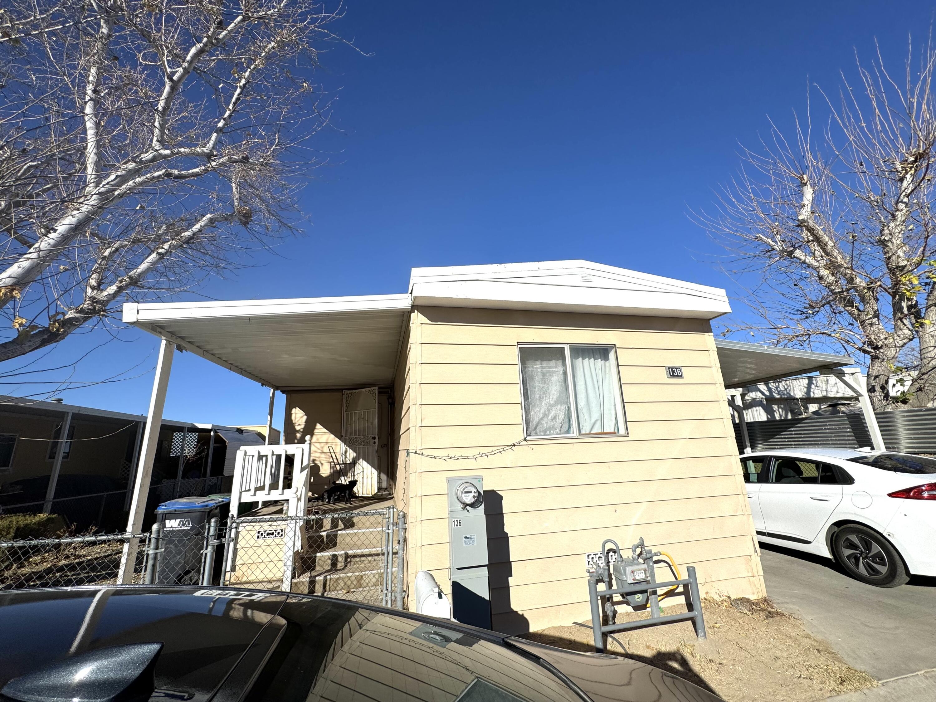 45800 Challanger Way Lancaster, CA 93535 - Photo 3 of 16 a view of a house with a patio
