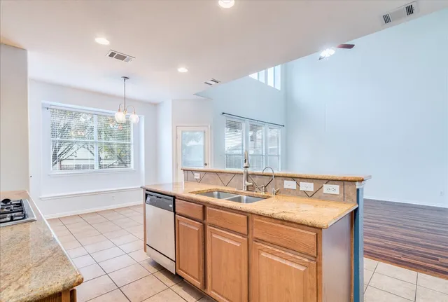 a bathroom with a sink double vanity and a tub