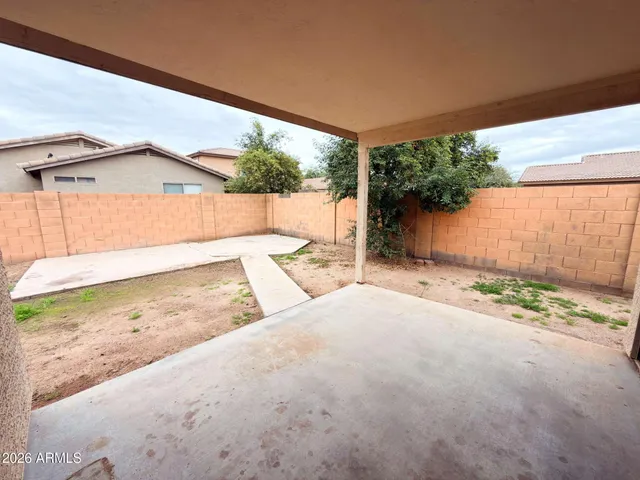 a view of a backyard of a house