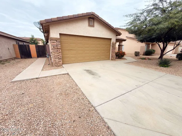 a front view of house with garage