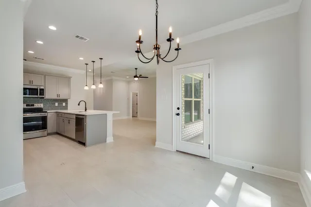 a view of a kitchen and a sink