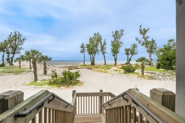 a view of a balcony with ocean view