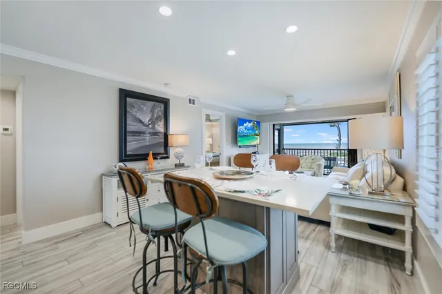 a very nice looking dining room with a table and chairs