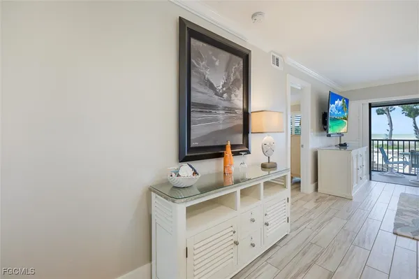 a room with furniture and a wooden floor