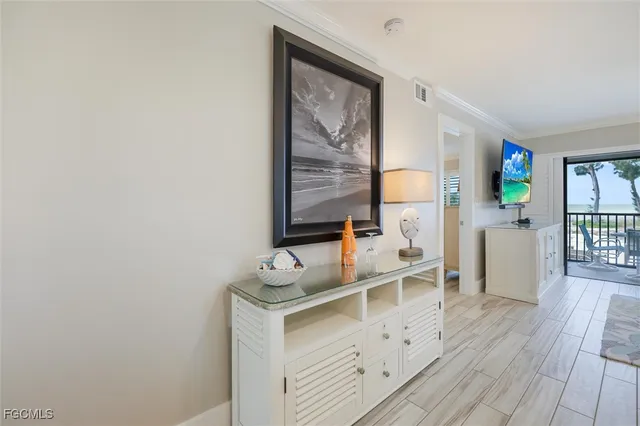 a room with furniture and a wooden floor