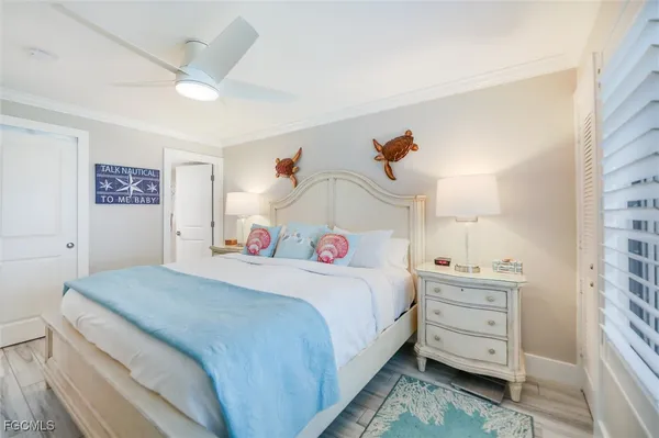 a bedroom with a bed and a cabinets